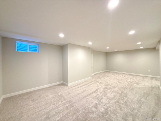 basement with light colored carpet