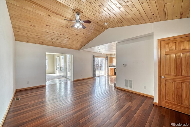 unfurnished room with hardwood / wood-style floors, lofted ceiling, visible vents, and a ceiling fan