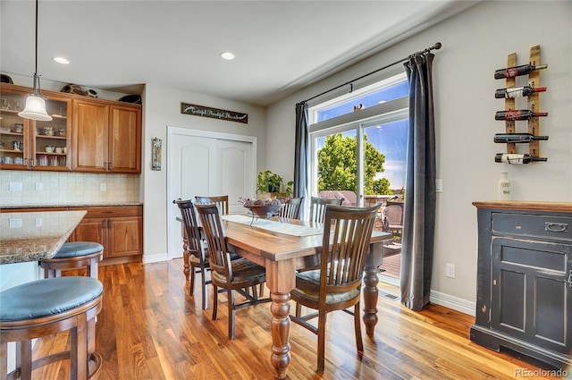 dining space featuring light hardwood / wood-style flooring