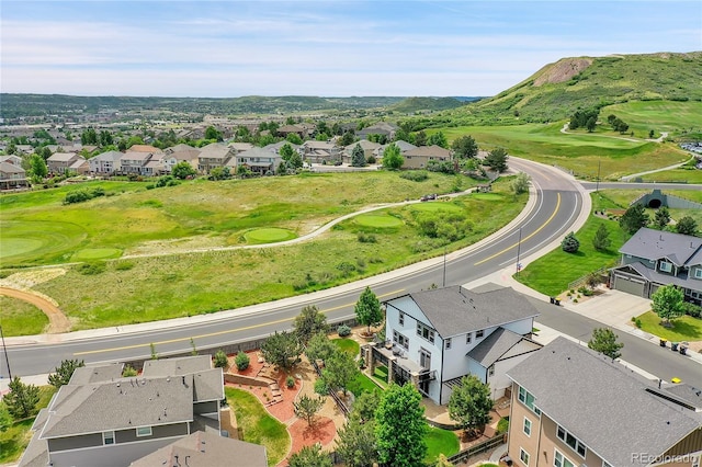 bird's eye view featuring view of golf course and a residential view