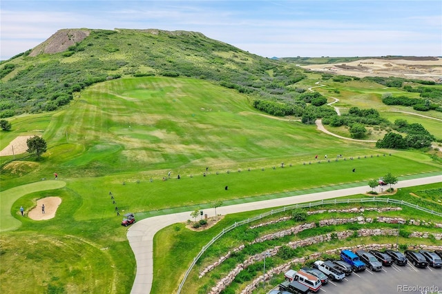 2314 Fairway Wood Cir, Castle Rock, CO 80109 - drone / aerial view of a mountainous background and a local golf course