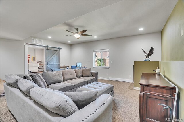 2314 Fairway Wood Cir, Castle Rock, CO 80109 - living room featuring a barn door, light carpet, recessed lighting, ceiling fan, and baseboards