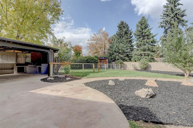 view of yard with an exterior structure, a playground, and an outdoor structure