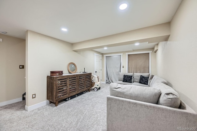 living room with carpet floors, baseboards, and recessed lighting