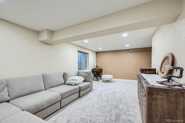 carpeted living room with recessed lighting and baseboards