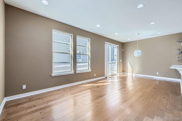 11323 Uptown Ave, Broomfield, CO 80021 - spare room with baseboards and recessed lighting