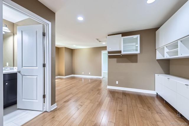 11323 Uptown Ave, Broomfield, CO 80021 - interior space featuring recessed lighting, baseboards, and light wood-style flooring