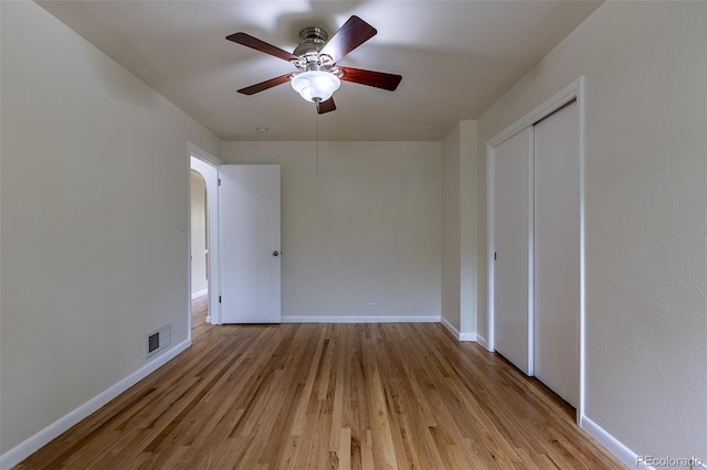 3256 S Ogden St, Englewood, CO 80113 - unfurnished bedroom featuring light wood-style flooring, baseboards, ceiling fan, and a closet