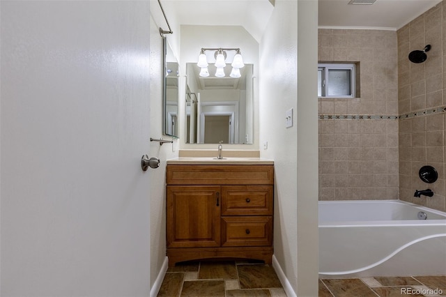 3256 S Ogden St, Englewood, CO 80113 - full bathroom with vanity, shower / bathtub combination, and baseboards