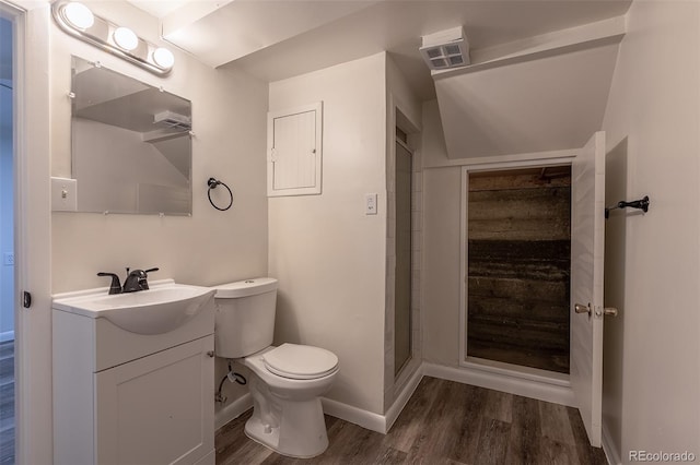 3256 S Ogden St, Englewood, CO 80113 - bathroom featuring vanity, wood finished floors, toilet, baseboards, and a shower