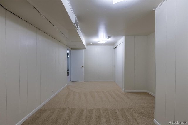 3256 S Ogden St, Englewood, CO 80113 - finished basement featuring carpet flooring, baseboards, and a decorative wall