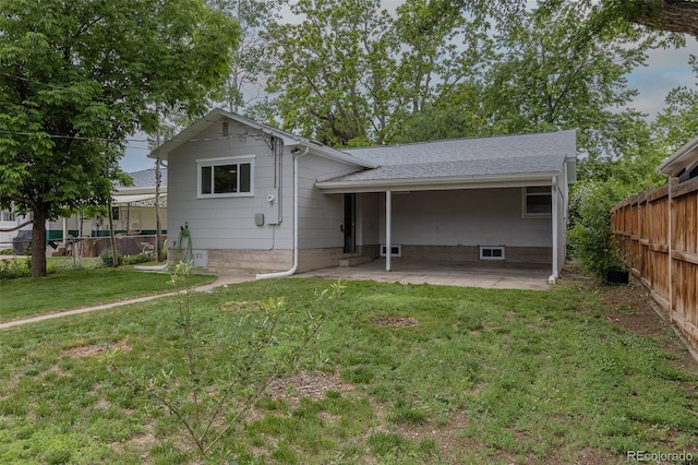 3256 S Ogden St, Englewood, CO 80113 - rear view of property with a patio and a shingled roof