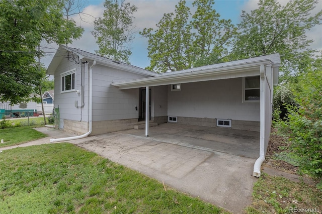 3256 S Ogden St, Englewood, CO 80113 - view of home's exterior featuring a carport