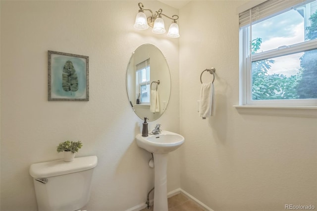 4807 Fenwood Dr, Highlands Ranch, CO 80130 - bathroom with toilet and baseboards
