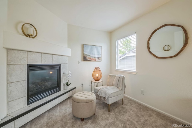 4807 Fenwood Dr, Highlands Ranch, CO 80130 - living area featuring carpet floors and a tile fireplace