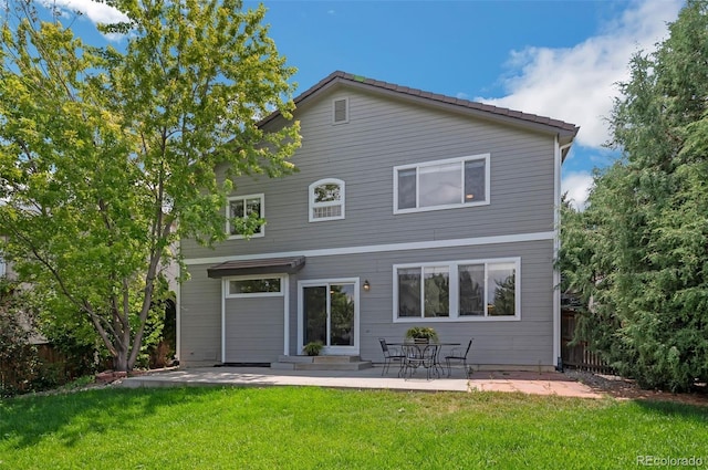 4807 Fenwood Dr, Highlands Ranch, CO 80130 - rear view of house with a patio