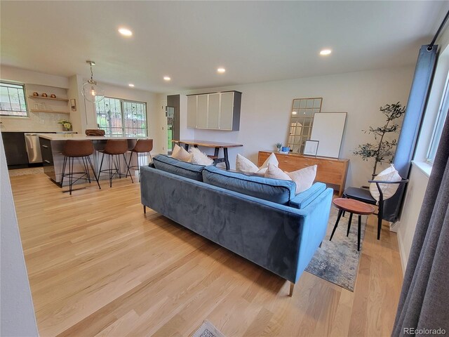 315 E 112th Dr, Northglenn, CO 80233 - living area with light wood-style floors and recessed lighting