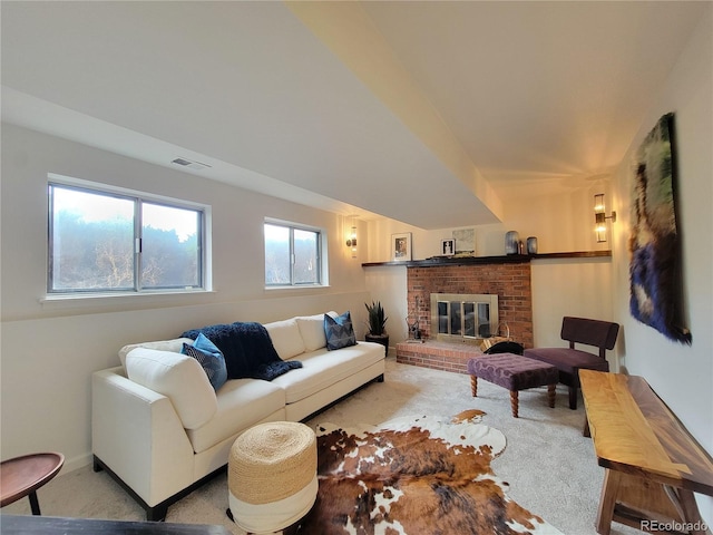 315 E 112th Dr, Northglenn, CO 80233 - living room with carpet floors and a brick fireplace