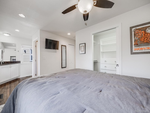 bedroom with recessed lighting, ceiling fan, visible vents, and dark wood-style floors