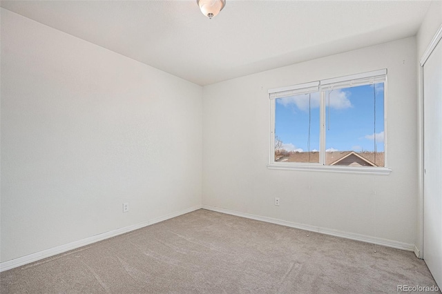 2791 S Bahama Ct, Aurora, CO 80013 - empty room featuring carpet and baseboards