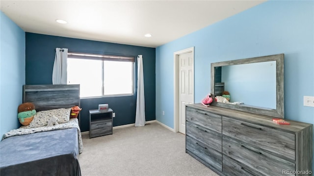 bedroom featuring recessed lighting, baseboards, and carpet