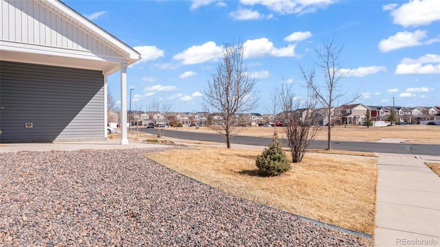 view of yard with a residential view