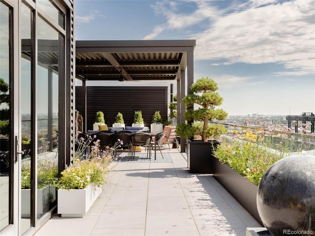 view of patio / terrace featuring a balcony