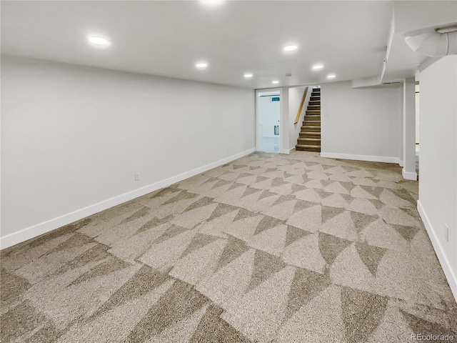 basement with light colored carpet