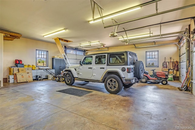 garage featuring a garage door opener