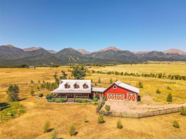 view of mountain feature with a rural view