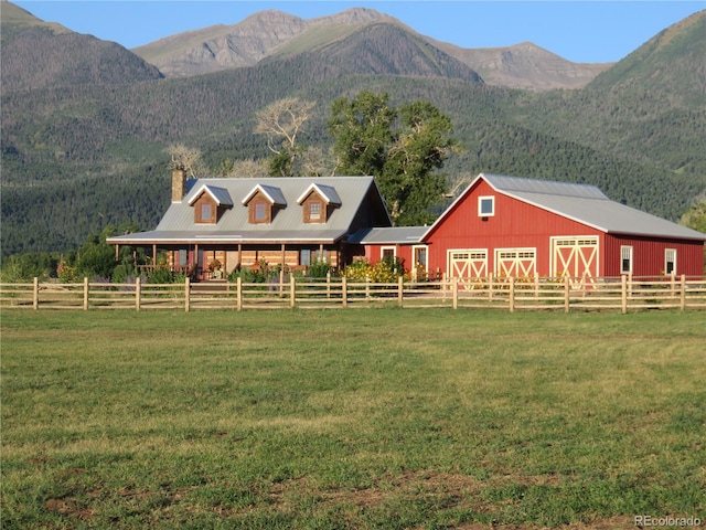 mountain view featuring a rural view