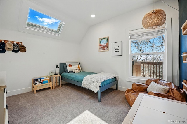 bedroom with recessed lighting, baseboards, lofted ceiling with skylight, and carpet floors