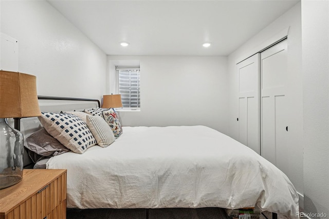 bedroom with a closet and recessed lighting
