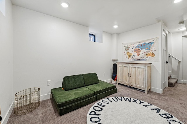 living area featuring baseboards, recessed lighting, and carpet flooring