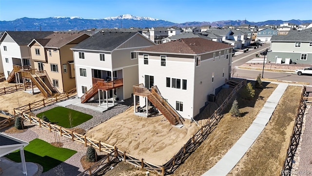 bird's eye view featuring a residential view and a mountain view