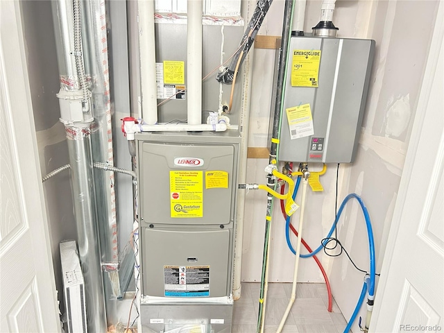 19221 E 65th Ave, Denver, CO 80249 - utility room with tankless water heater