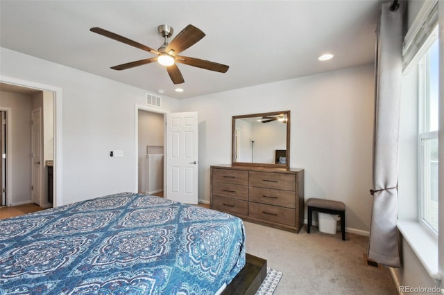 19221 E 65th Ave, Denver, CO 80249 - bedroom featuring multiple windows, recessed lighting, a ceiling fan, and light colored carpet