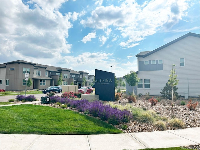 19221 E 65th Ave, Denver, CO 80249 - community sign featuring a residential view and a yard