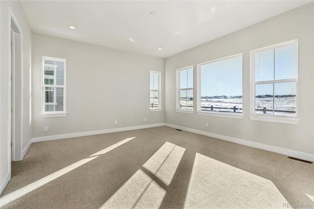 view of carpeted spare room