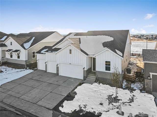 view of front of home with a garage