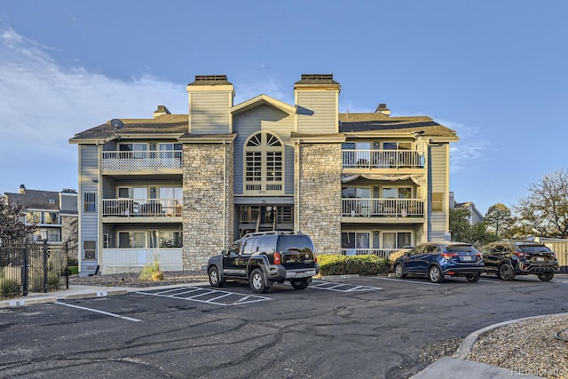 8853 Colorado Blvd Unit A-106, Thornton, CO 80229 - view of building exterior with uncovered parking