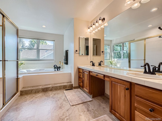 6577 S Waco Way, Aurora, CO 80016 - full bath with double vanity, a bath, and a stall shower