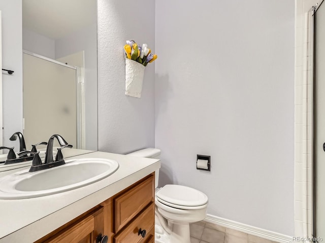 6577 S Waco Way, Aurora, CO 80016 - full bath with a shower with door, vanity, and tile patterned flooring