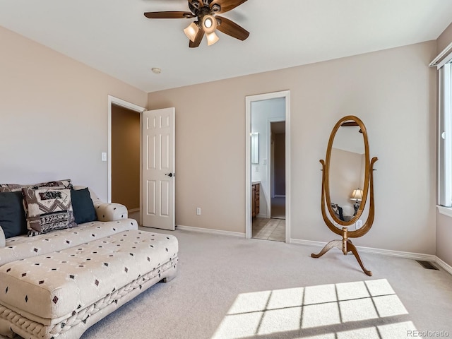 6577 S Waco Way, Aurora, CO 80016 - bedroom with light carpet, ensuite bath, and a ceiling fan