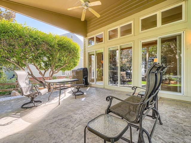 6577 S Waco Way, Aurora, CO 80016 - view of patio / terrace featuring a ceiling fan and outdoor dining space