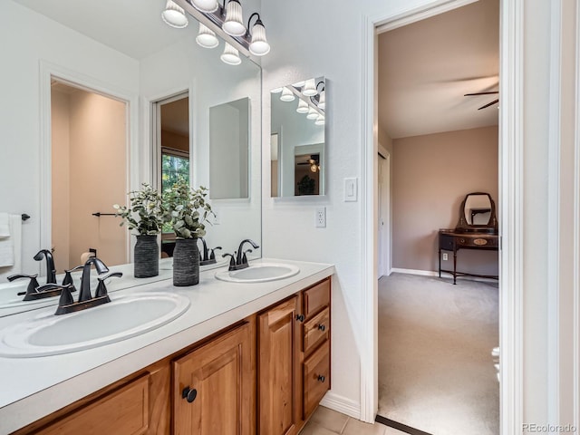 6577 S Waco Way, Aurora, CO 80016 - full bath featuring a ceiling fan, double vanity, and a chandelier