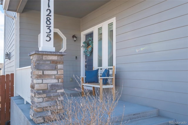 doorway to property with covered porch