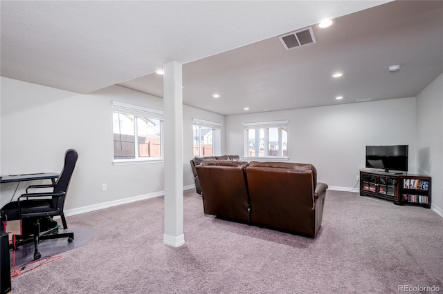 interior space with baseboards, visible vents, and recessed lighting