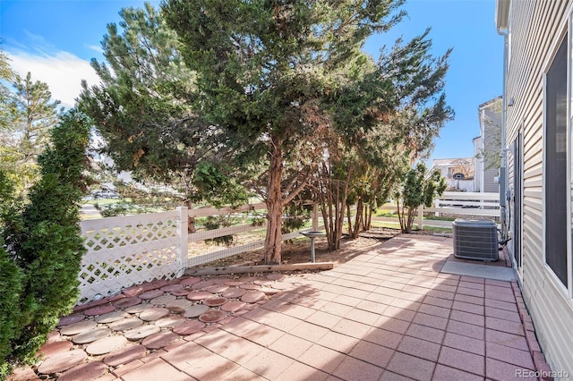 view of patio / terrace featuring cooling unit