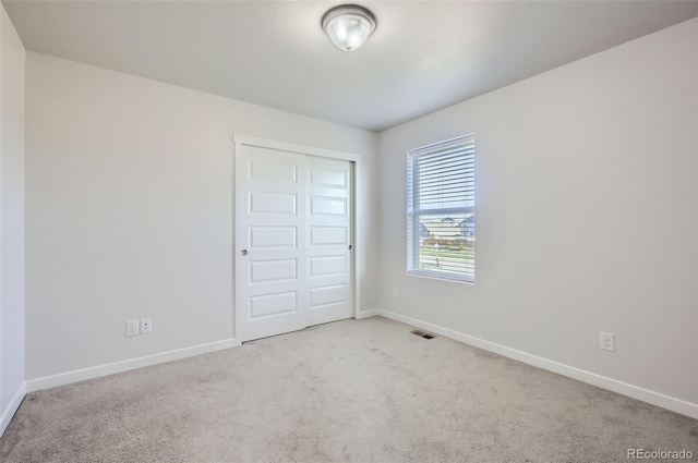 1464 Moraine Valley Dr, Severance, CO 80550 - unfurnished bedroom featuring carpet flooring and a closet